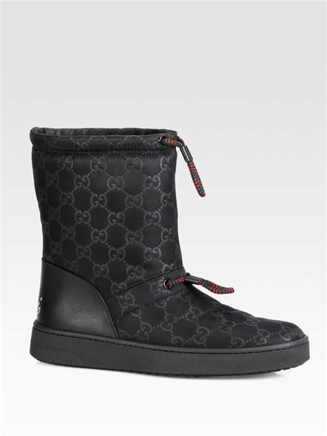 gucci guccissima leather-trimmed snow boots|Gucci boots with rhinestones.